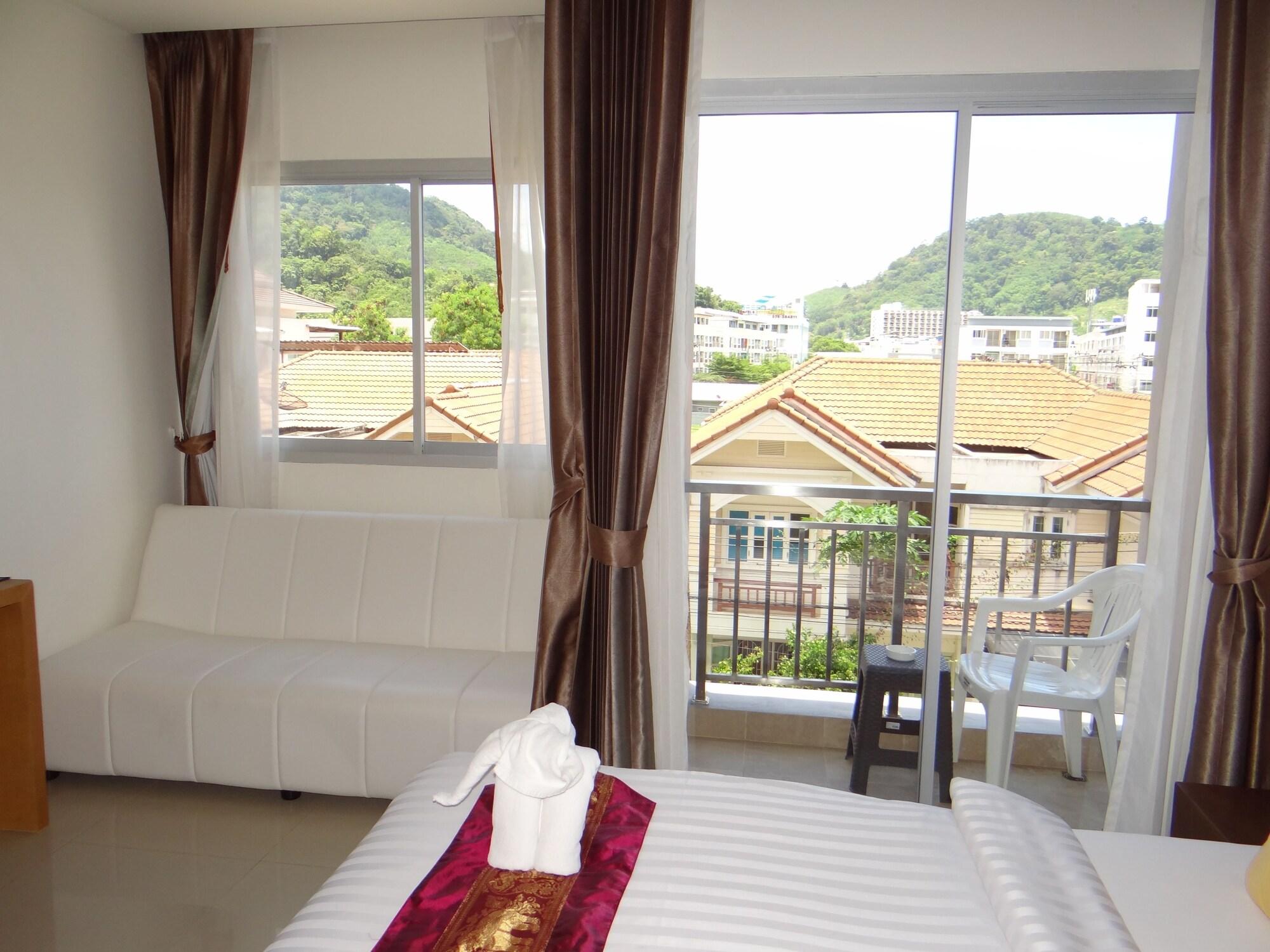 Tropical Sunset Hotel Patong Exterior photo